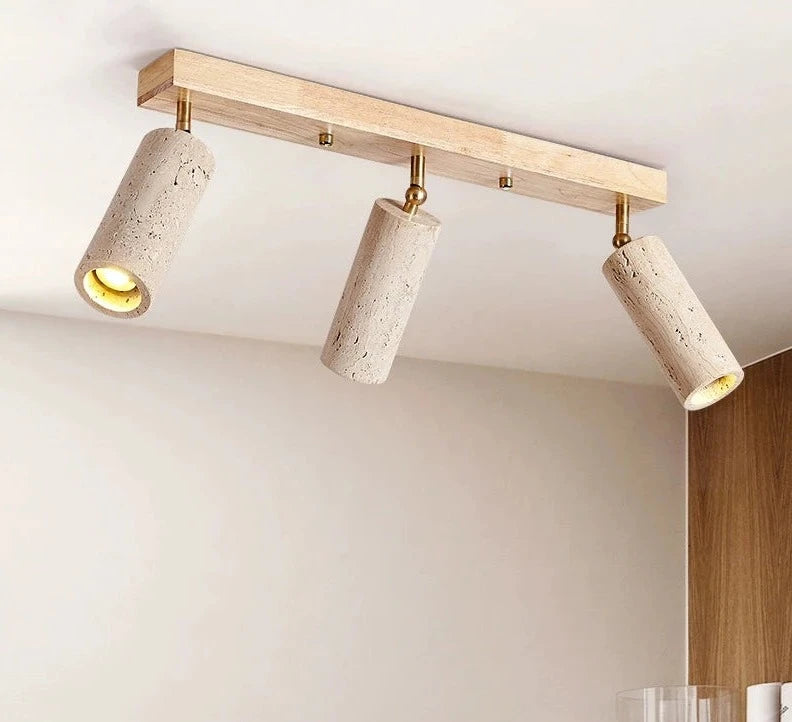 LUXELY 3-head spotlight ceiling lamp mounted on a white ceiling, showcasing stone-textured lights and wood accent for stylish room lighting.