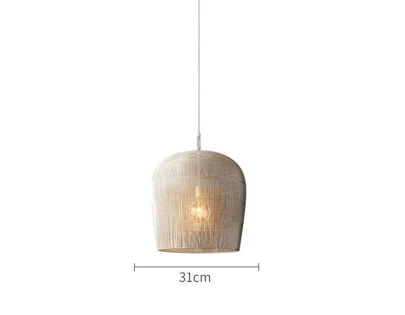 Compact 31cm white LUXELY rattan pendant light, perfect for small spaces or layered lighting designs.
