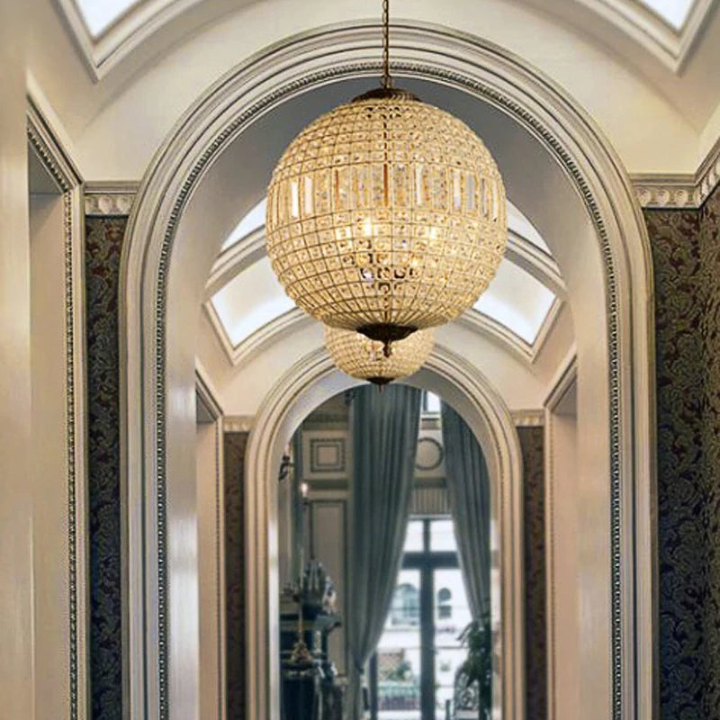 Elegant LED Retro Crystal Chandelier hanging in a luxury villa hallway, enhancing the classic architectural ambiance.