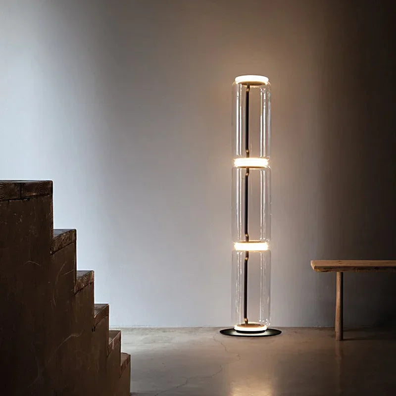 Modern Italian glass floor lamp – minimalist nordic design with three illuminated glass sections, ideal for contemporary interiors.