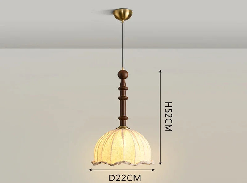 Modern Art Hanging Lamp with dome-shaped cloth shade and wood stem, a Nordic pendant light for cozy interiors.