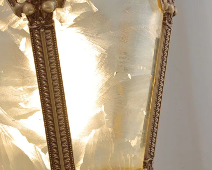 Textured ice flower glass panel of French retro chandelier glowing under LED light. Copper frame adds vintage charm.