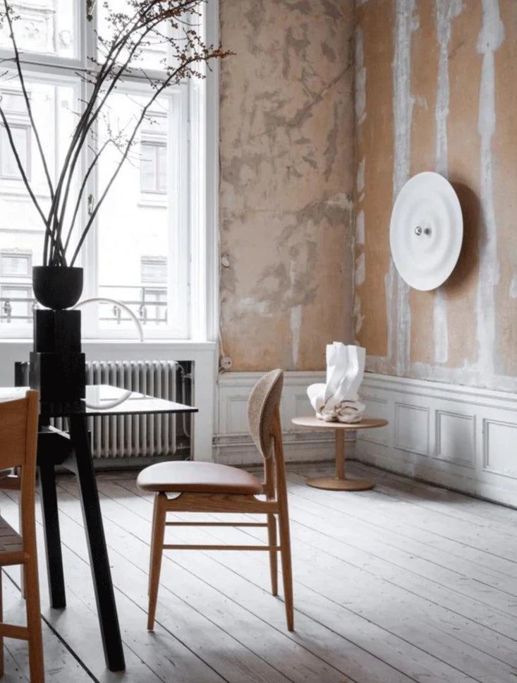 Modern round bedroom sconce