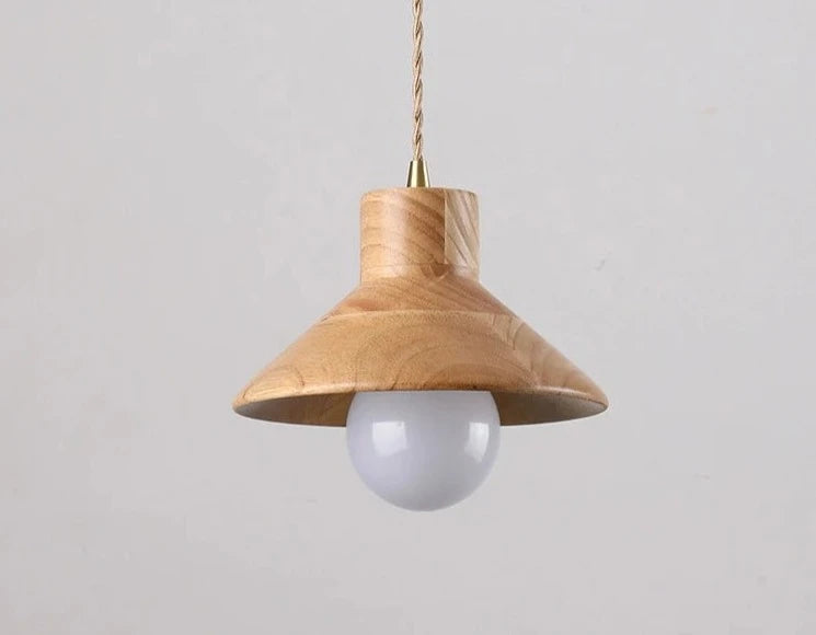 Single Nordic wood pendant light with smooth conical shade and exposed bulb, perfect for minimalist kitchen or bedroom lighting.