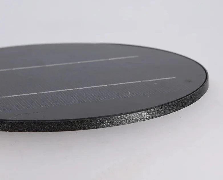 Close-up of the solar panel top of LUXELY outdoor garden light, showcasing efficient solar energy absorption.