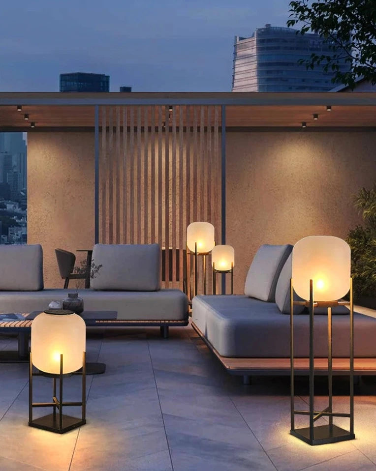 Modern villa terrace lit with LUXELY solar powered garden lights, showcasing stylish and weatherproof outdoor lighting.