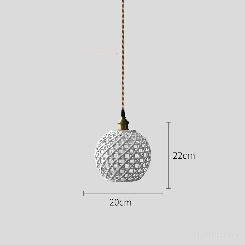 White spherical LUXELY ceramic pendant light with 20cm diameter and 22cm height, ideal for small dining room lighting.