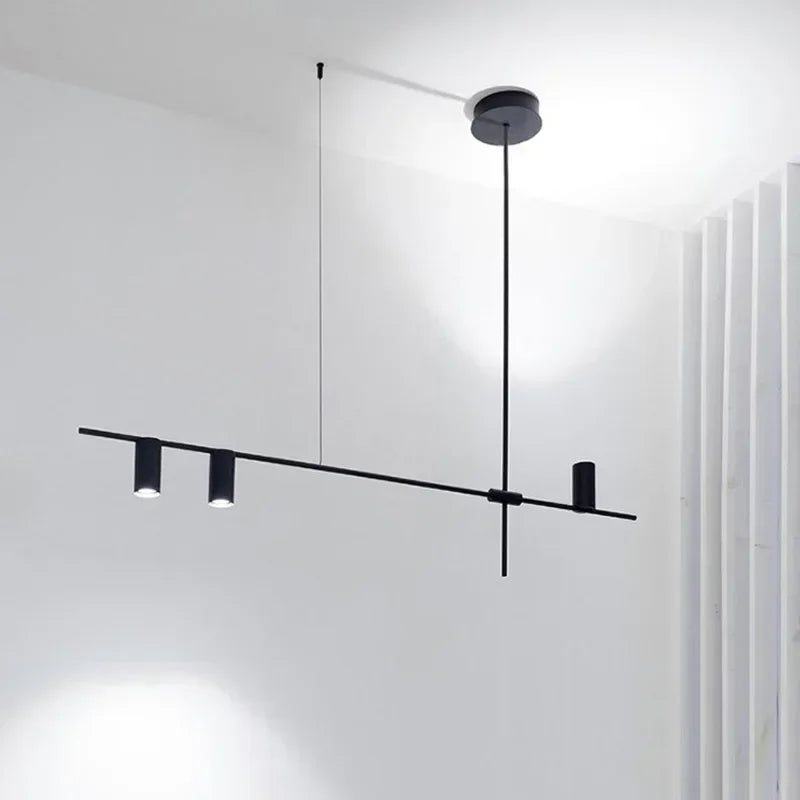 Sleek black ceiling-mounted modern minimalist spotlight bar with vertical rod and LED lights, perfect for hallway or office ceilings.