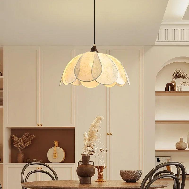 Modern Art Hanging Lamp with soft petal-shaped cloth shade, a Nordic pendant light ideal for warm dining room lighting.