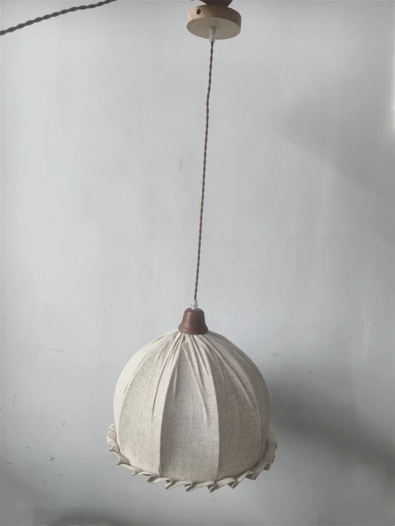 Full view of hanging Japanese fabric pendant lamp with dome shape, suitable for modern home lighting fixtures.