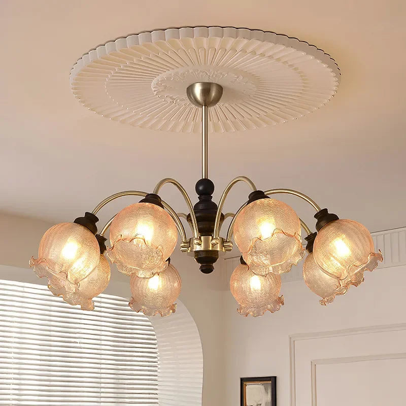 LED American chandelier with six crystal flower lampshades, mounted on a white ceiling medallion, ideal for home lighting upgrades.