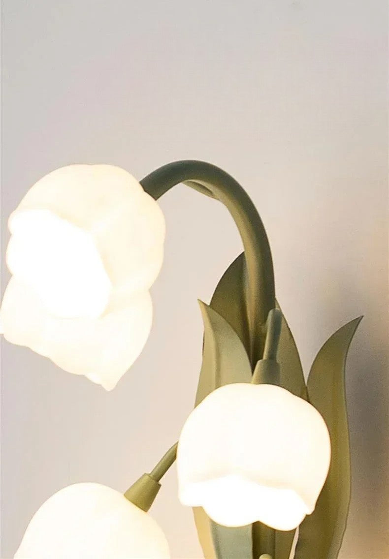 Detailed view of Nordic Atmosphere Wall Lamp's floral LED bulbs and green leaves, emphasizing its Nordic design elements.