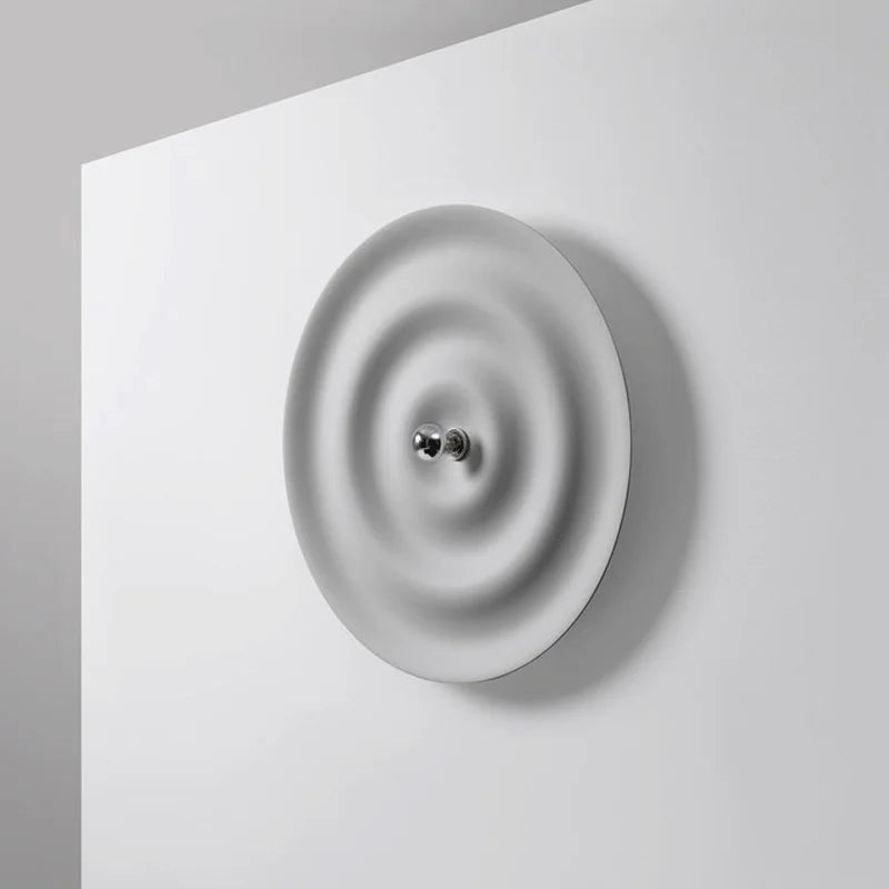 Modern round bedroom sconce