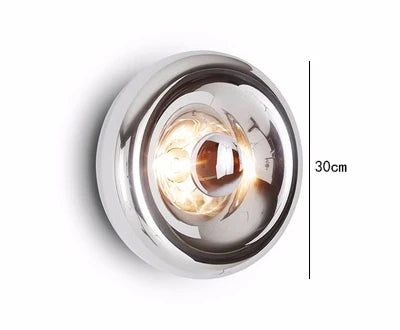 30cm silver round lava wall lamp with glowing LED center, ideal for modern bedroom or hallway lighting.