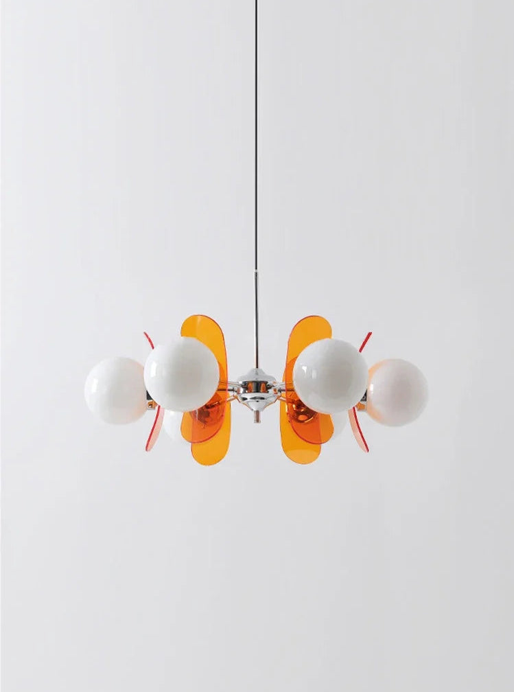 Minimalist Bauhaus retro chandelier with orange panels and LED globes, suspended for artistic dining room lighting.