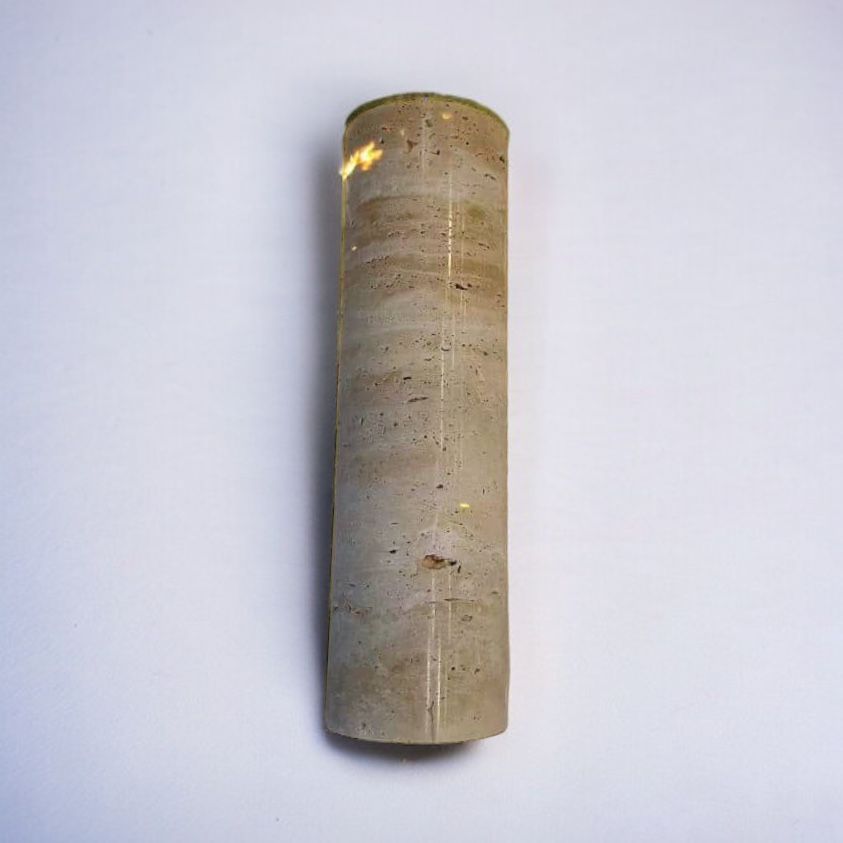 Unlit IP65 Travertine wall lamp showcasing natural stone texture, perfect for modern home and garden lighting design.
