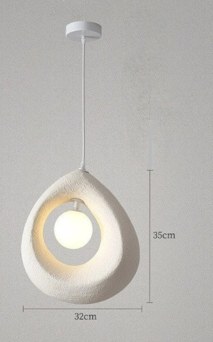Soft white art deco pendant light with LED bulb and textured surface, ideal for dining or hallway lighting.