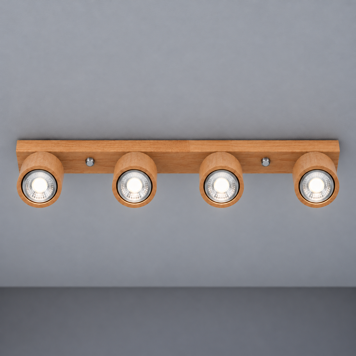 Wood ceiling bar with pivoting spotlights — Wood beige 4 lights, axial underside view, illuminated