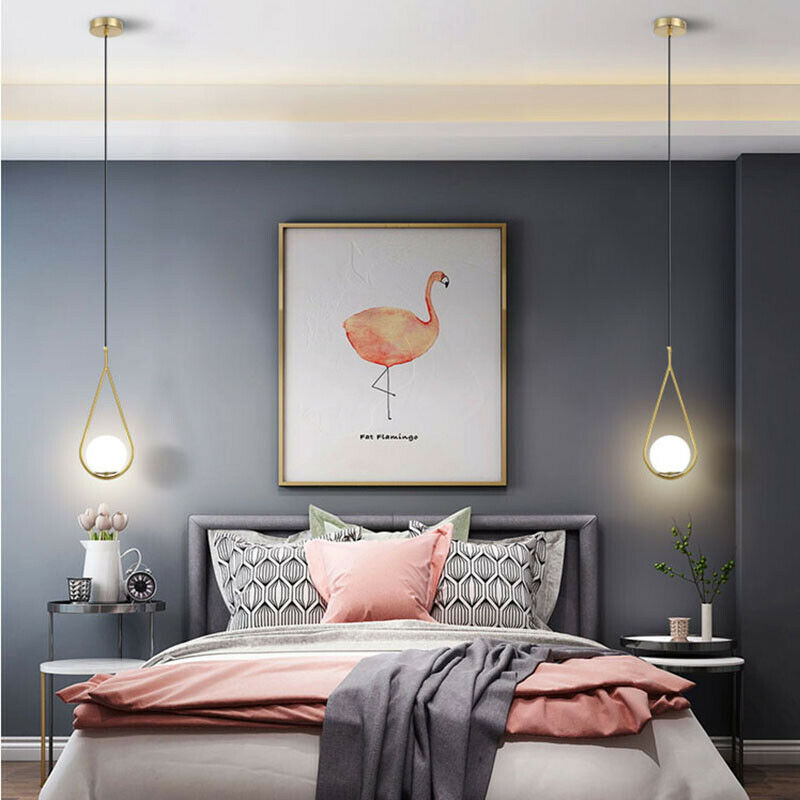 Waterdruppelvormige hanglamp met gouden afwerking