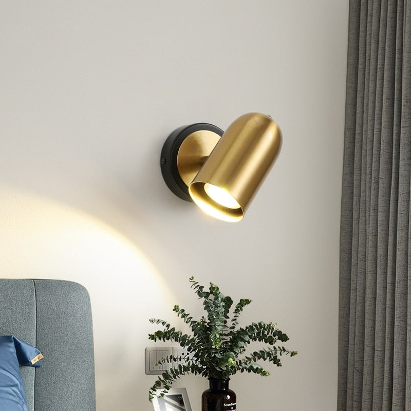 Lampe murale dorée réglable