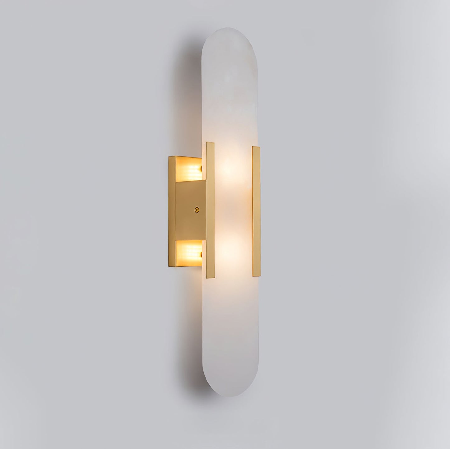 Oval vägglampa i marmor