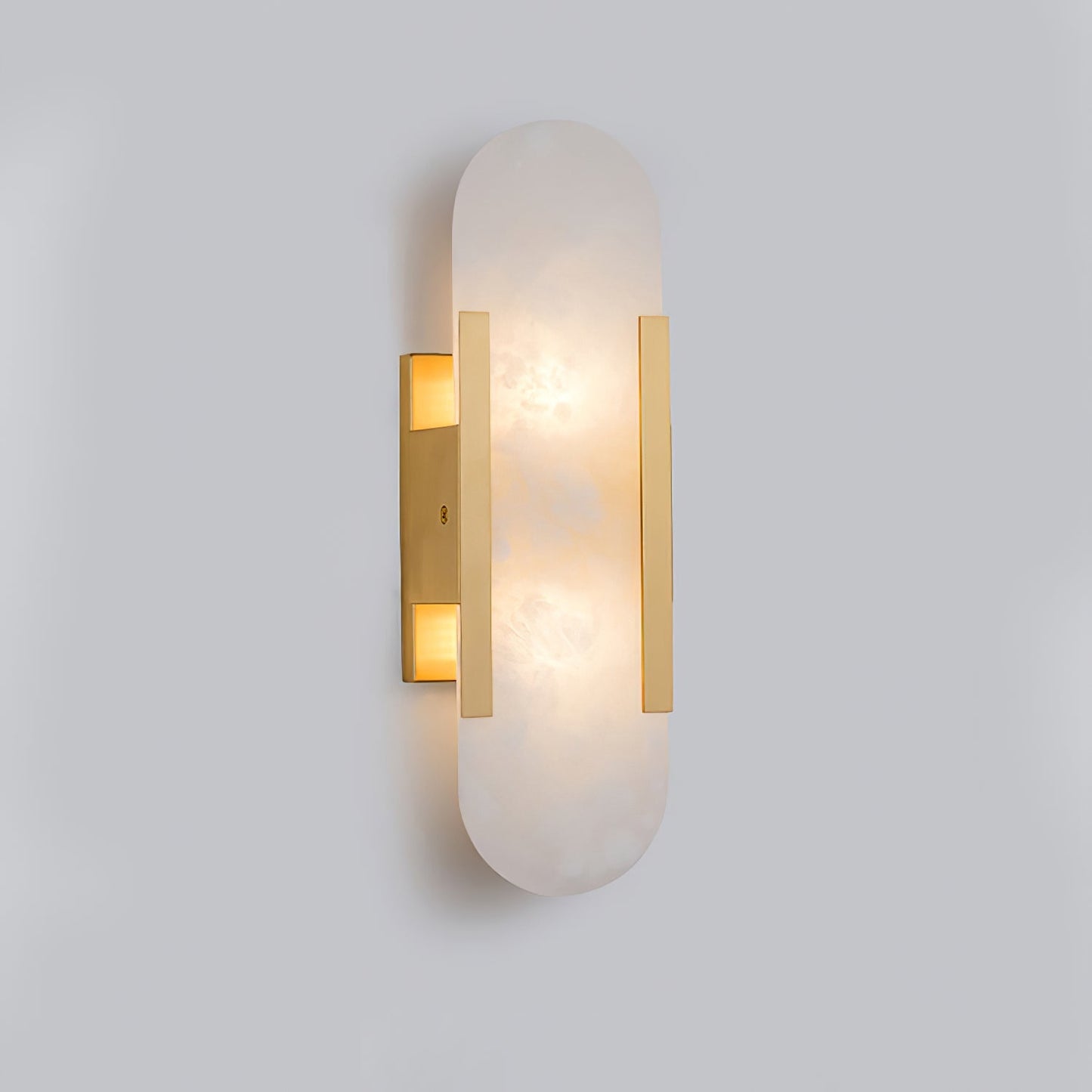 Oval vägglampa i marmor