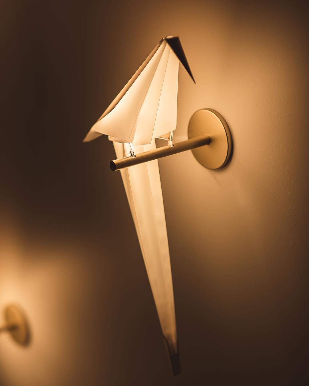 Lampe murale en forme d'oiseau