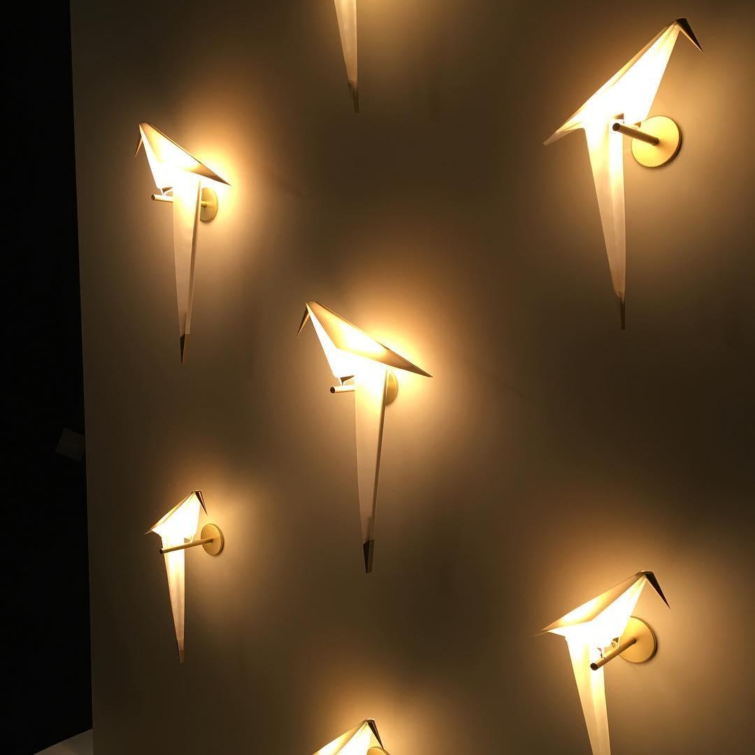 Lampe murale en forme d'oiseau