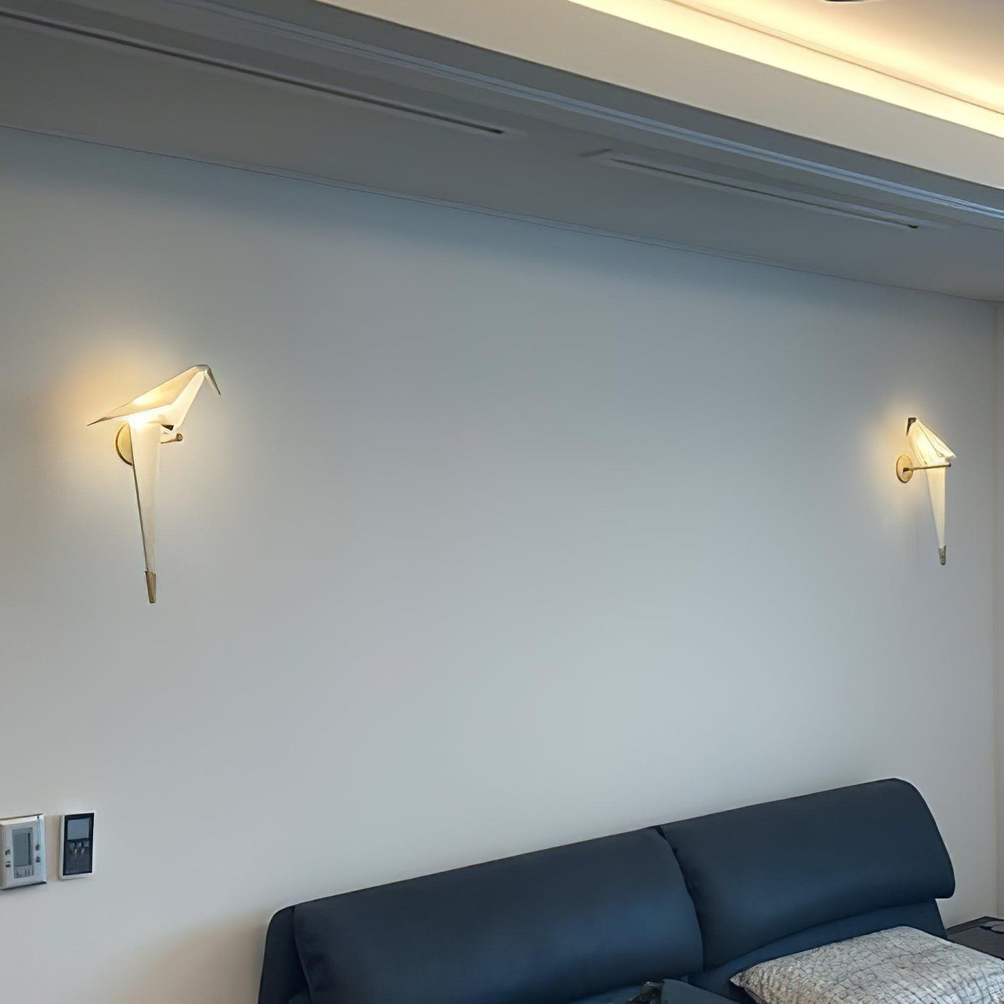 Lampe murale en forme d'oiseau