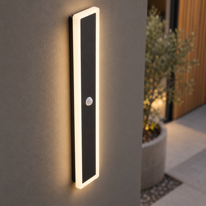 Black linear outdoor wall light with motion sensor, close-up of the material and edge