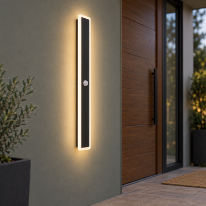 Black linear outdoor wall light with motion sensor, centred installed view