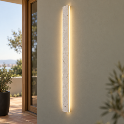 Beige slim natural stone outdoor wall light, centred installed view