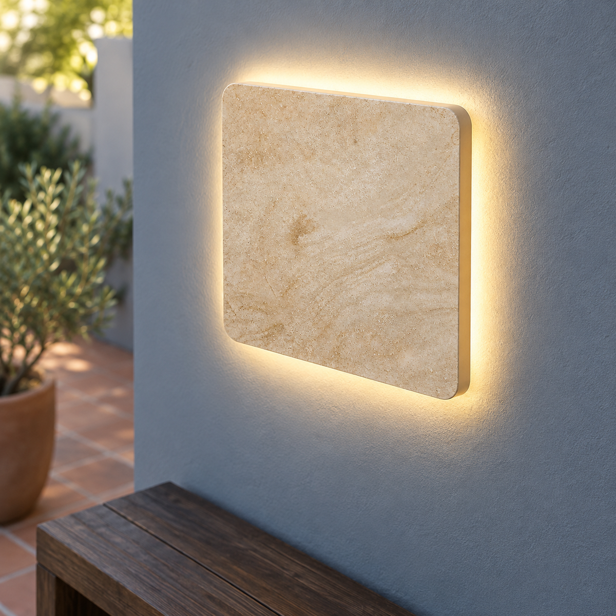 Square natural stone outdoor wall light, medium above-angle installed view