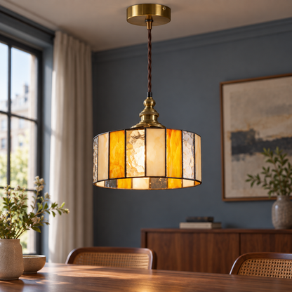 Amber and cream stripes stained-glass pendant, centred illuminated commercial view