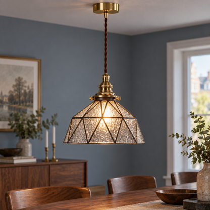 Clear geometric stained-glass pendant, centred illuminated commercial view