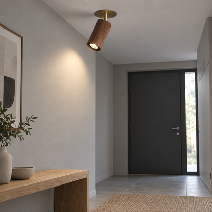 Underside view of the wooden ceiling spotlight installed above a hallway