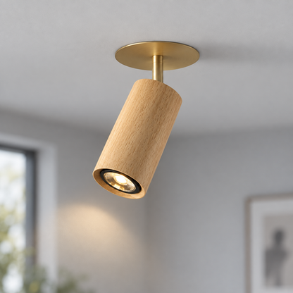 Light wood ceiling spotlight with a slim brass canopy