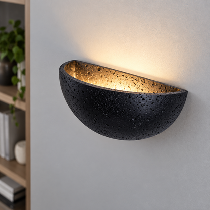 Above-angle view of the black stone half-moon wall uplight