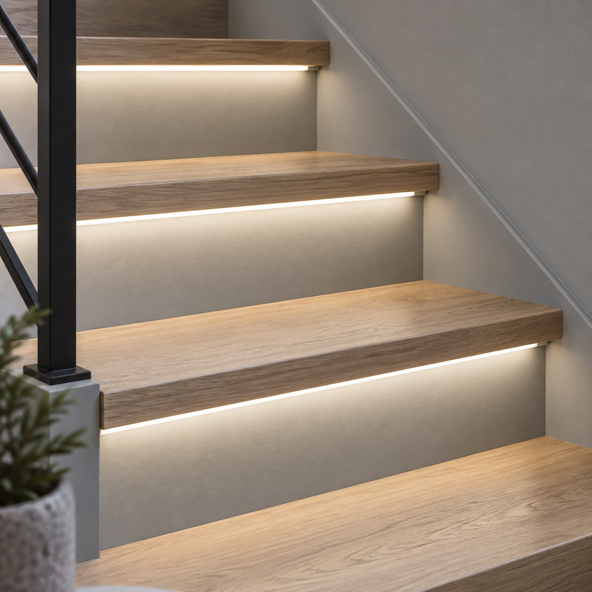 Neutral light (4500K) COB LED stair strips installed under oak treads