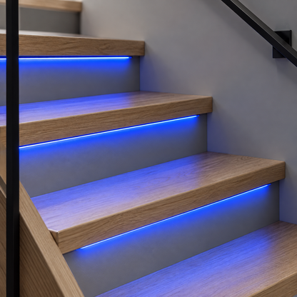 Blue COB LED stair strips installed under oak treads