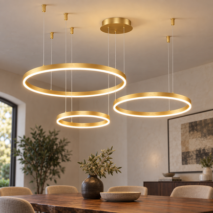 Gold three-ring LED chandelier with 80, 60 and 40 cm rings, installed commercial view