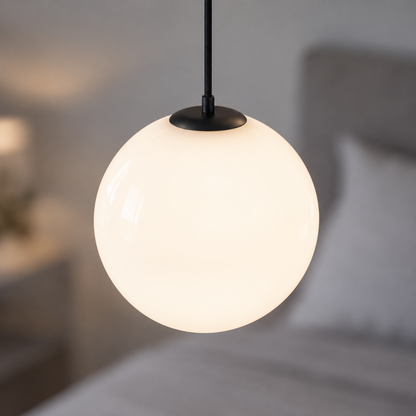 Small white glass globe pendant, close-up of opal glass and black fitting
