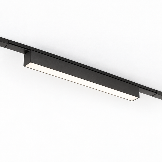 Black 23 cm linear LED module and matching surface rail on a pure white background