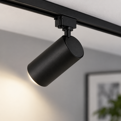 Detailed rear-side view of the black spotlight head, pivot and track clip