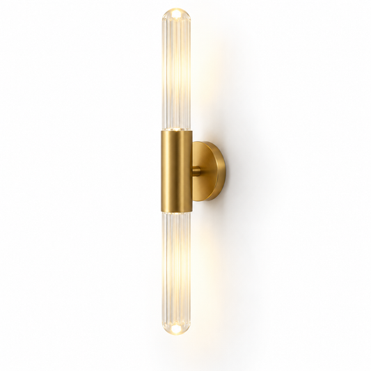 Clear fluted glass rod LED wall light on a pure white background