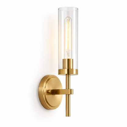 Gold clear glass cylinder wall light on a pure white background