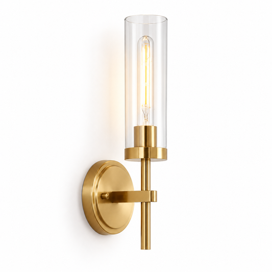 Gold clear glass cylinder wall light on a pure white background