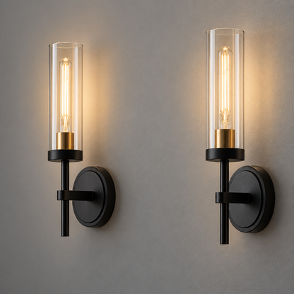 Pair of black clear glass cylinder wall lights with gold sockets
