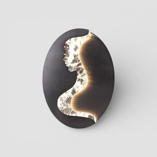 Abstract face wall sconce