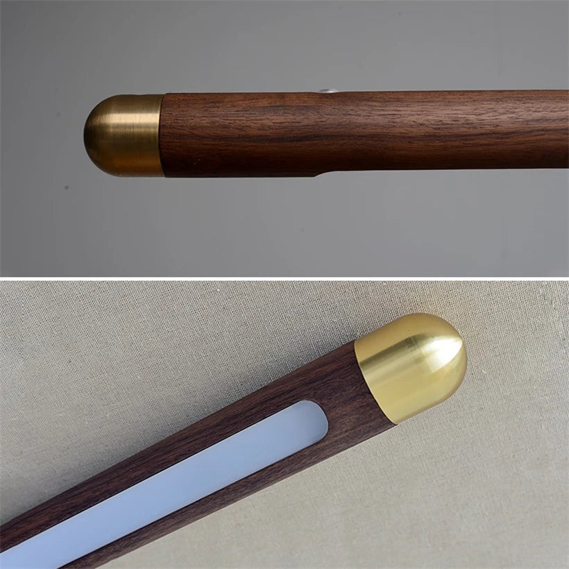 Detail of Black Walnut Pendant Light with brass accent and LED diffuser, emphasizing its handcrafted wooden finish and modern appeal.